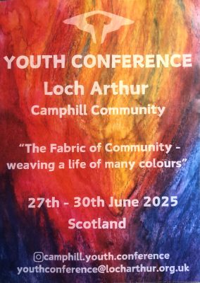 Poster reads "The Fabric of Community, weaving a life of many colours"