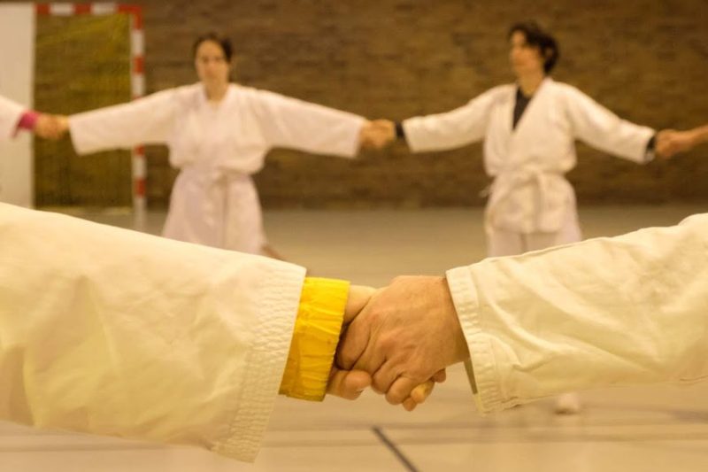 Holding hands in a circle