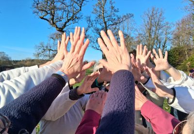 A forest of hands move towards each other in Tenshingoso 'Ee' movement